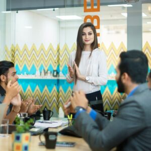 men and women having a meeting